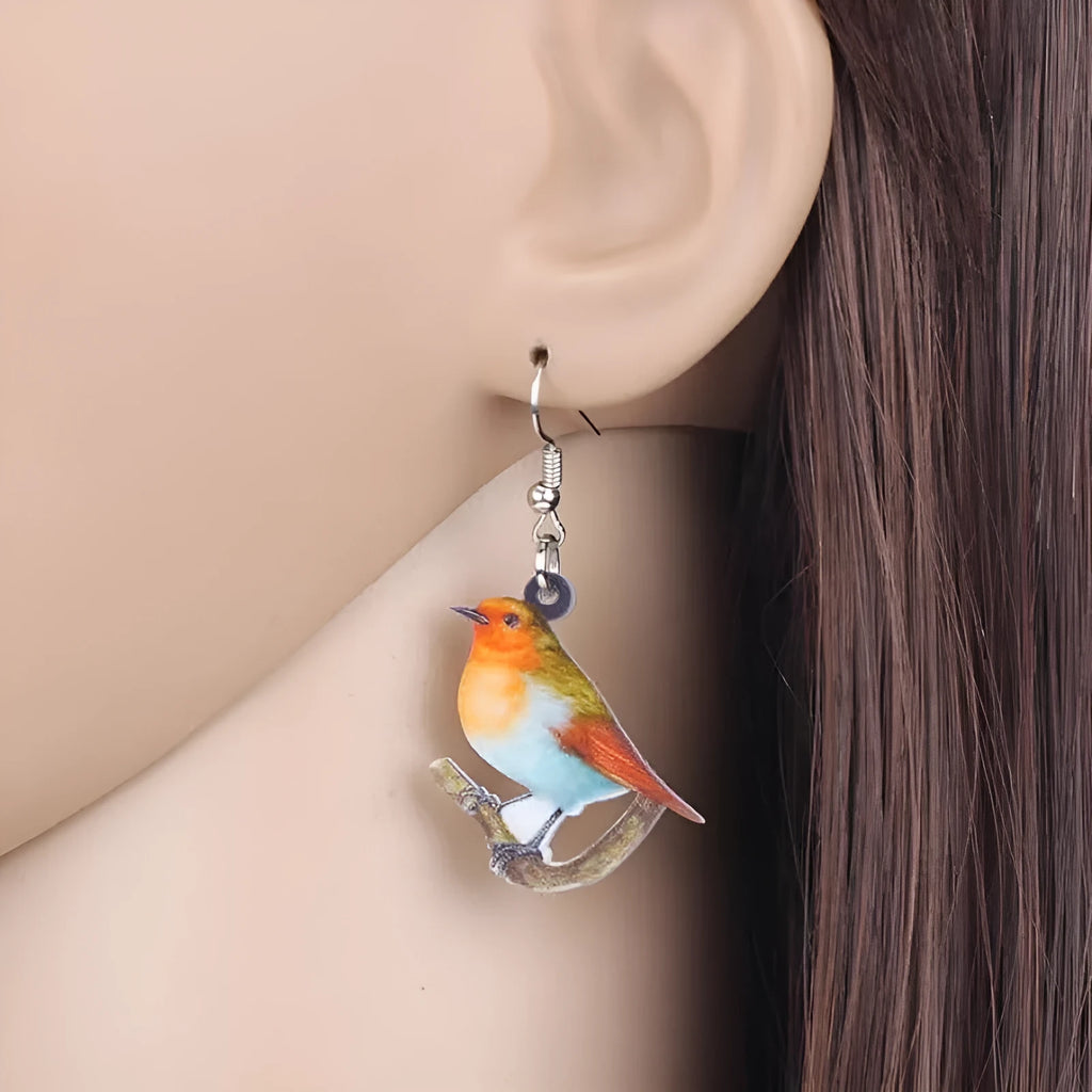 Blue titmouse and geometric snake design on lightweight acrylic drop earrings