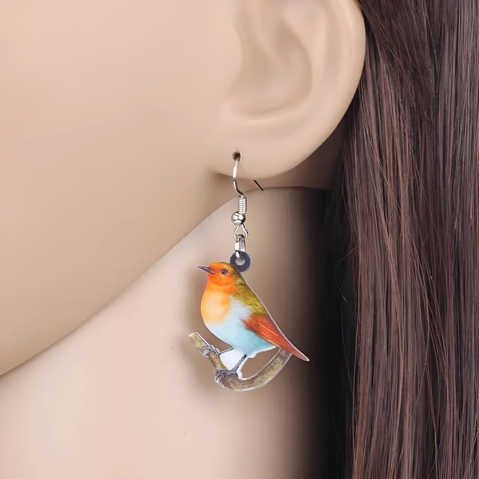 Blue titmouse and geometric snake design on lightweight acrylic drop earrings