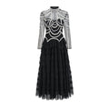 Women's black beaded long sleeve dress with mid-waist design and full-length skirt