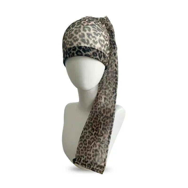 Wig mesh cap in spandex material with adjustable oversleeve construction shown in multiple colour options