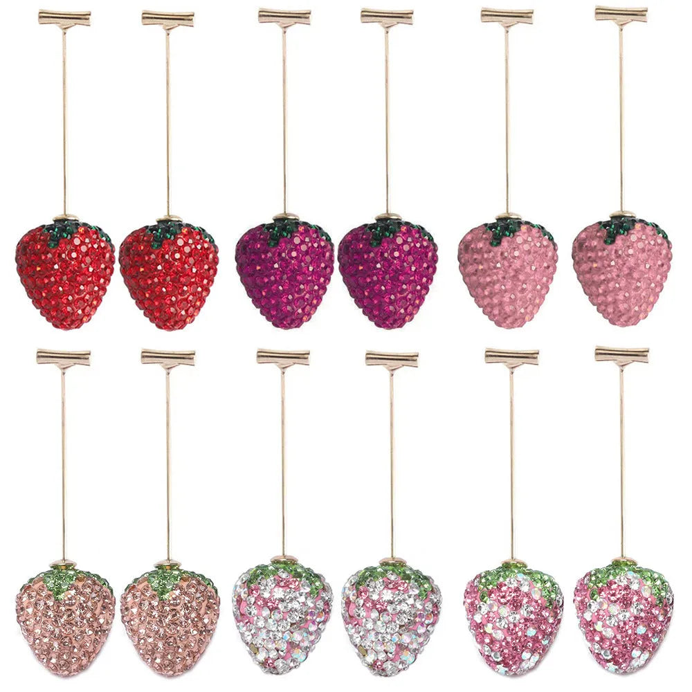 Geometric red strawberry stud earrings with spot-drill texture on a zinc alloy charm.