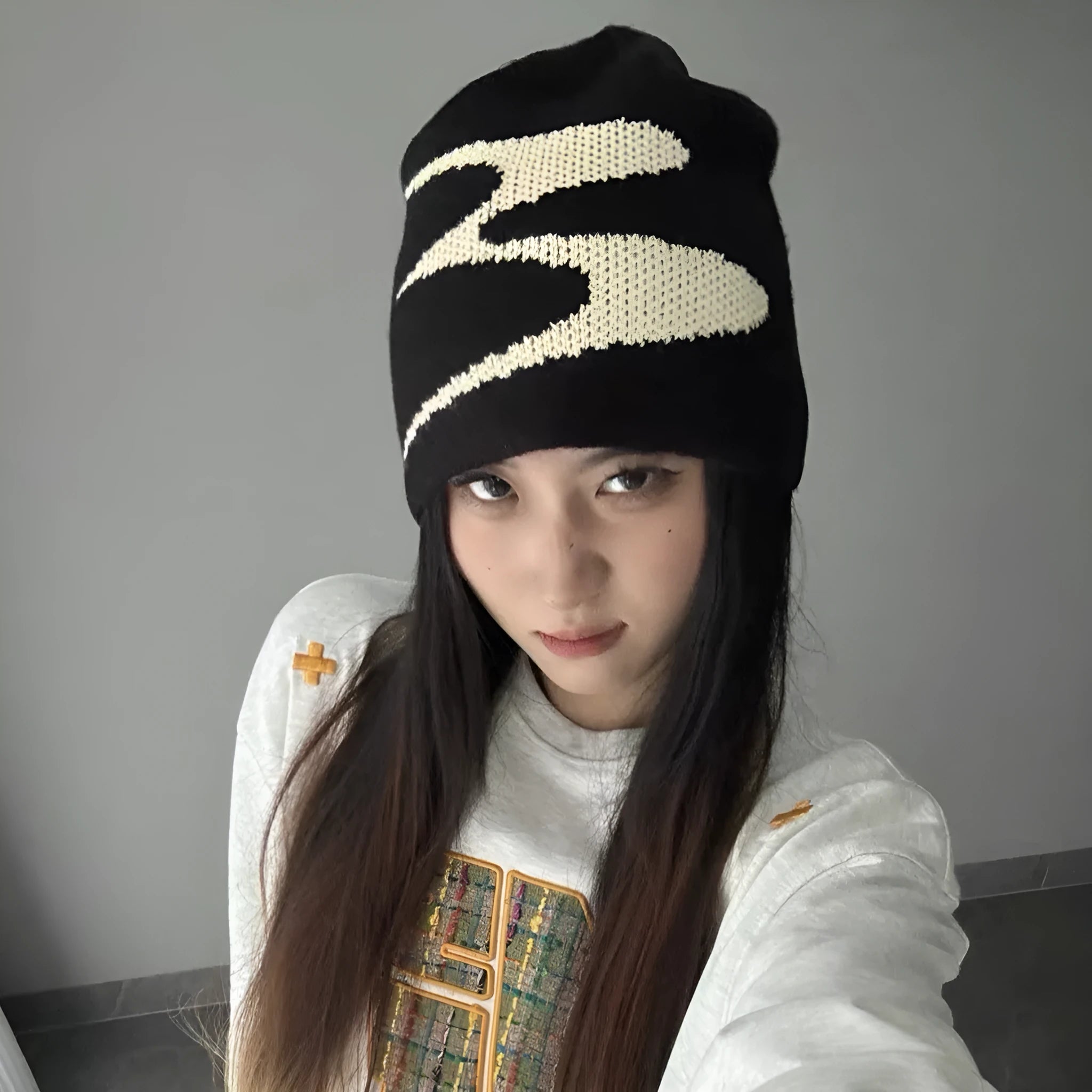 Knitted acrylic beanie hat in black, grey or white colours for autumn and winter wear