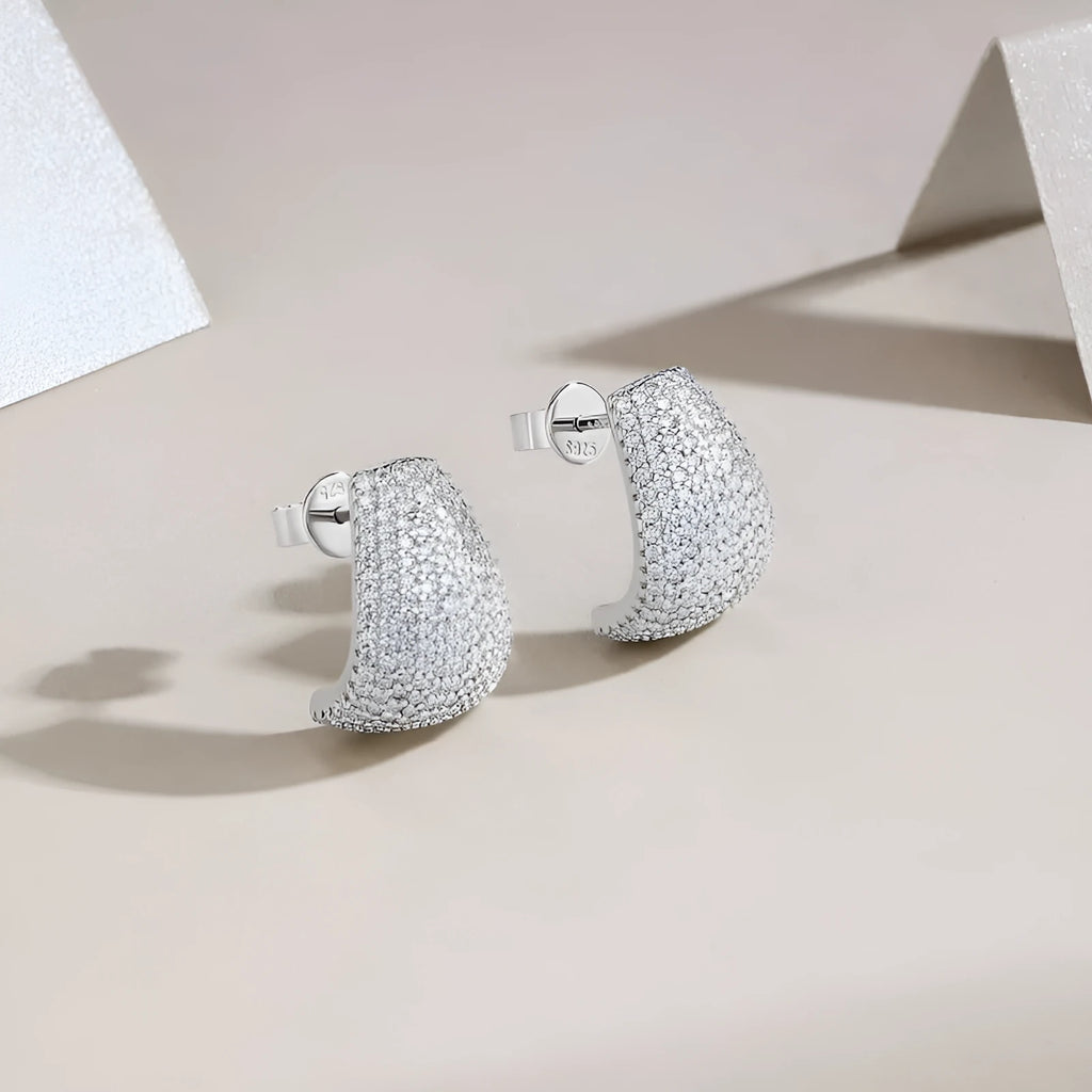 Geometric sterling silver ear studs with moissanite stones in gift box