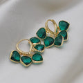 Green heart-shaped pendant clip earrings with artificial gemstone, in a gift box.