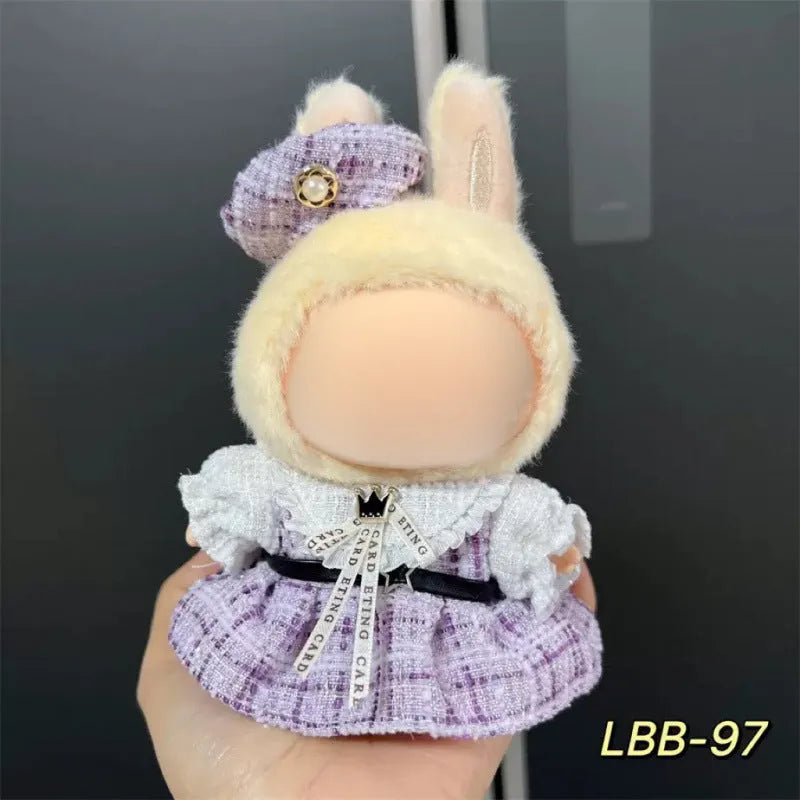A plastic doll costume for a 17cm tall vinyl figurine on a white background.