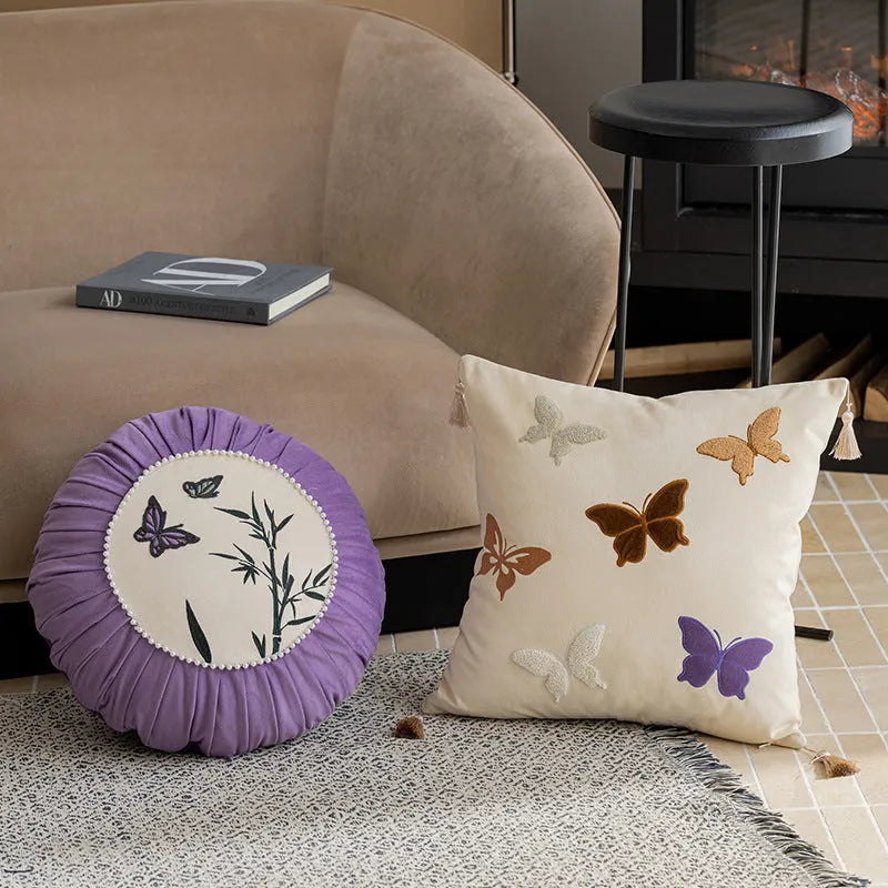 Square beige cushion with detailed Chinese style butterfly embroidery, 45x45cm.