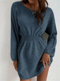 Blue women's slim-fit knitted dress with hand-crocheted flowers and a fitted waist.