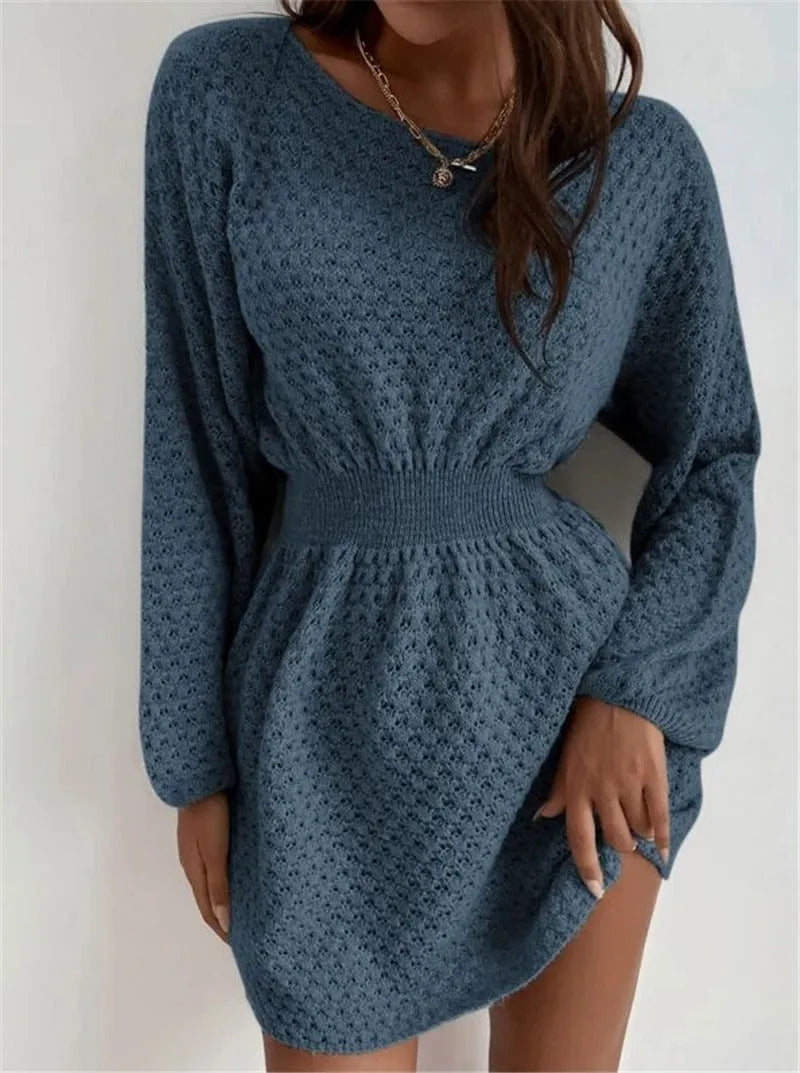 Blue women's slim-fit knitted dress with hand-crocheted flowers and a fitted waist.