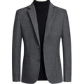 Men's slim-fit wool blend suit jacket in grey on a hanger
