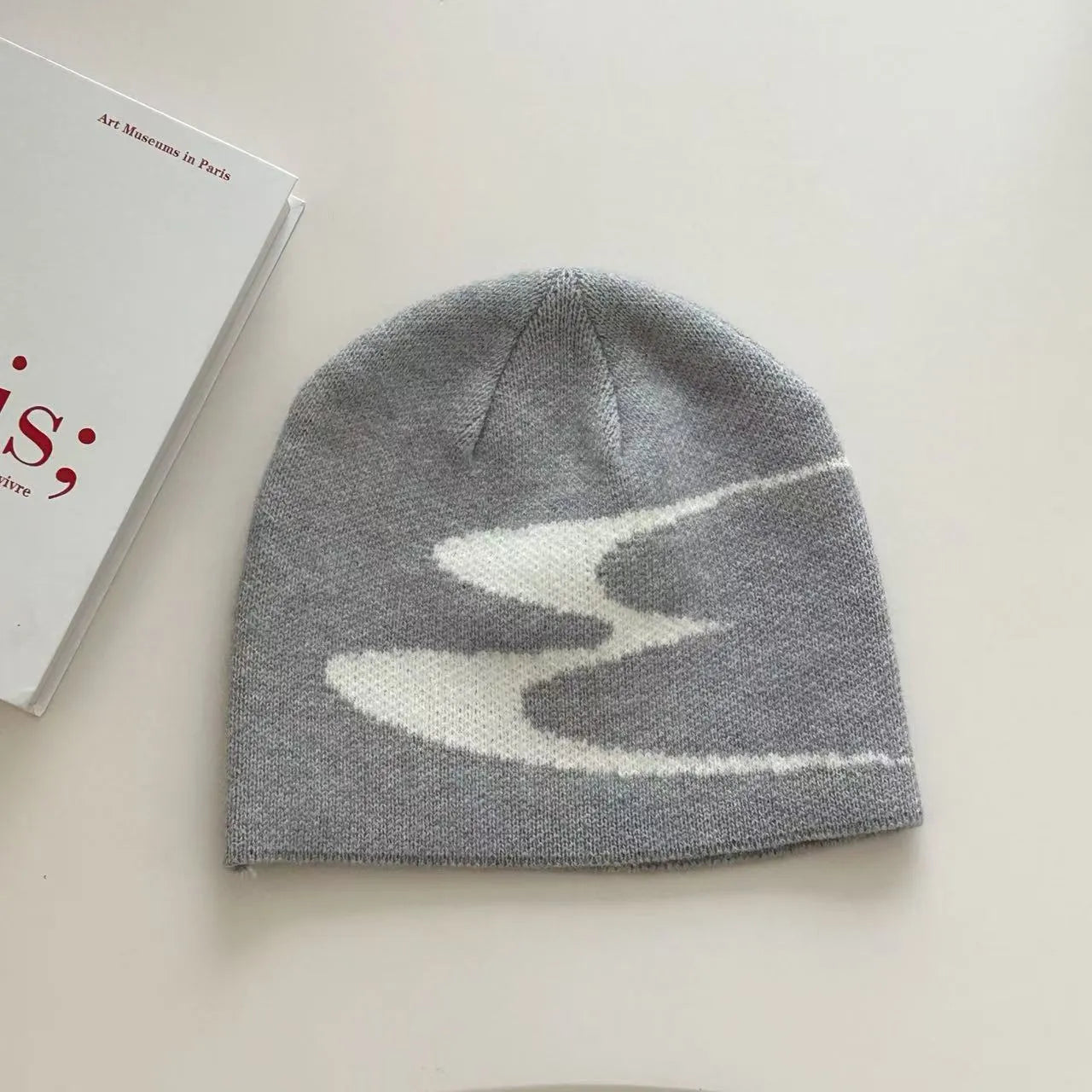 Knitted acrylic beanie hat in black, grey or white colours for autumn and winter wear