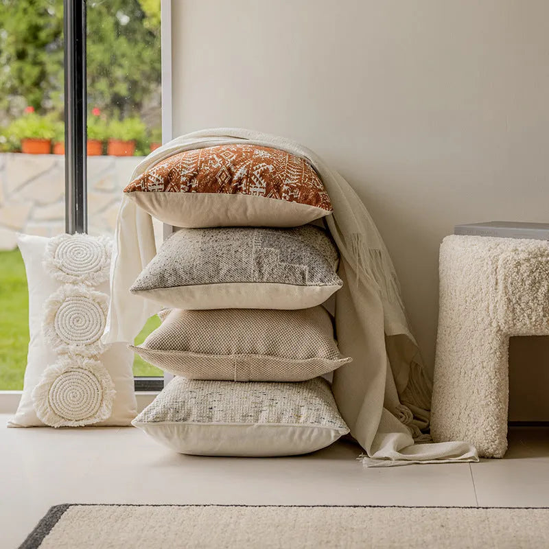 Square 45x45cm sofa cushion pillow in a solid colour and an abstract red-brown patterned option.