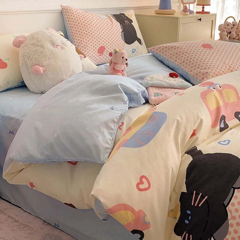 Cartoon dog pattern 100% cotton duvet cover and pillowcases on a single bed with a fitted sheet.