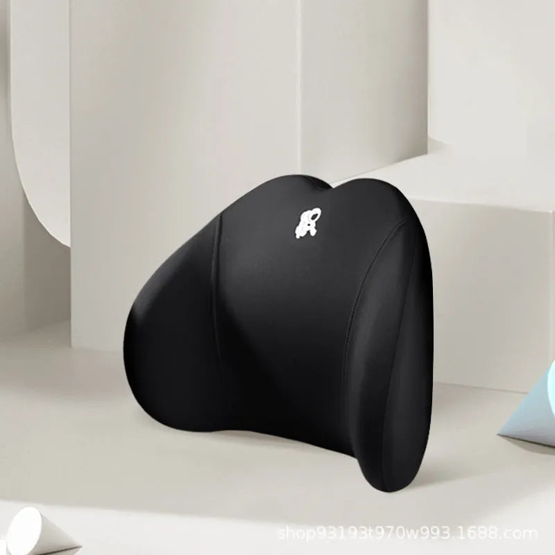 Heart-shaped car pillow in choice of colours, shown as headrest and lumbar support on a car seat.