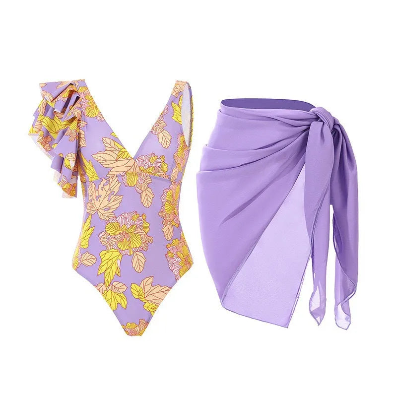 Women's solid colour one-piece swimsuit with spaghetti straps and a separate skirt.