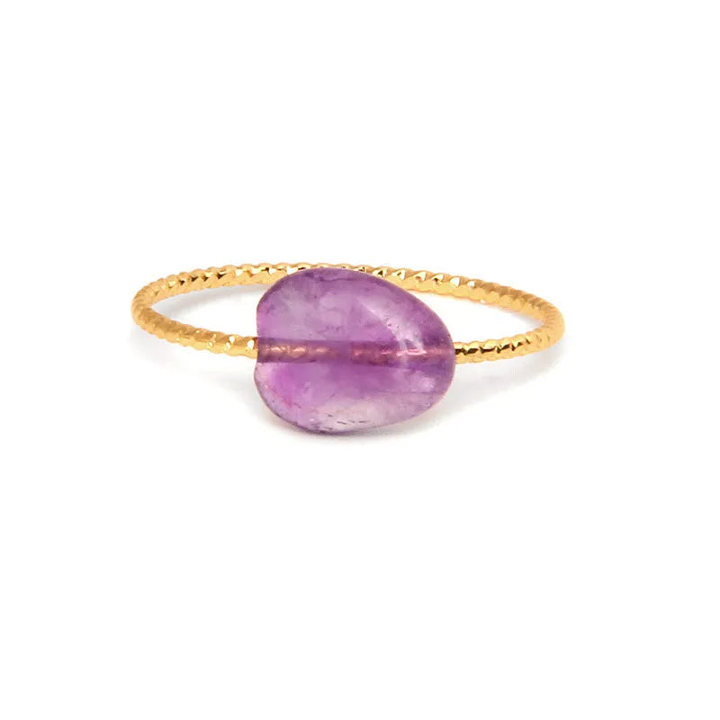 A women's ring featuring a geometric design set with a coloured agate stone.