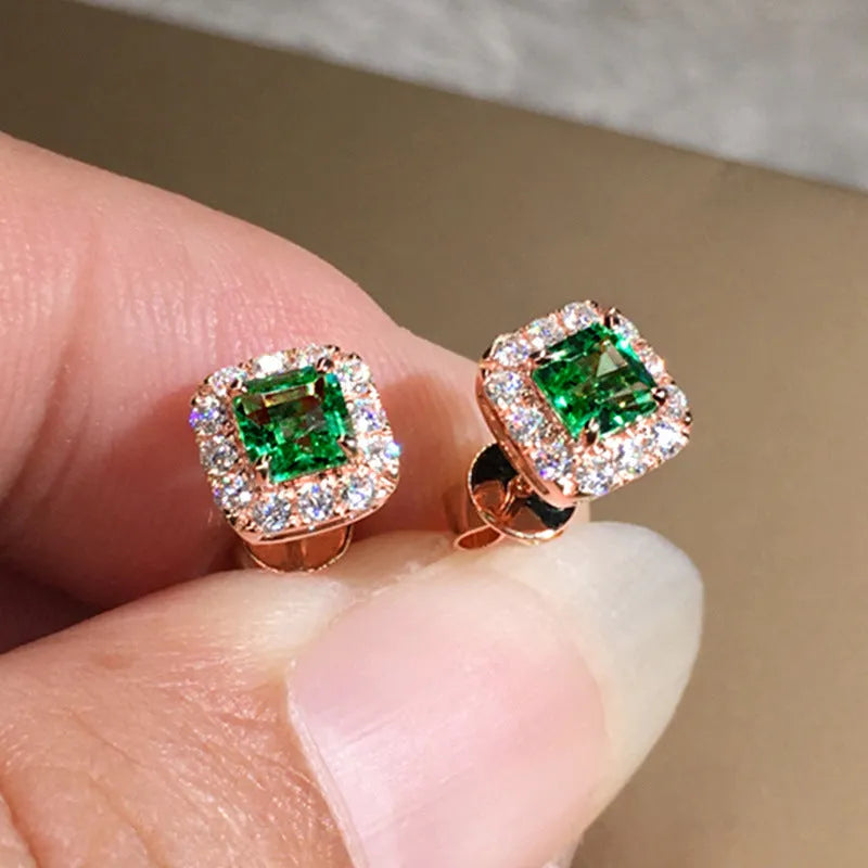 Square-cut grandmother green zircon stud earrings in electroplated copper with gold or white gold colour options.