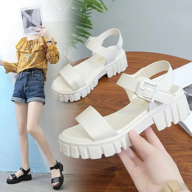 Women's beige peep toe platform sandals with an ankle-strap buckle on a white background
