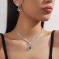 Claw chain necklace and earrings set with rhinestone drop elements in multiple colour options