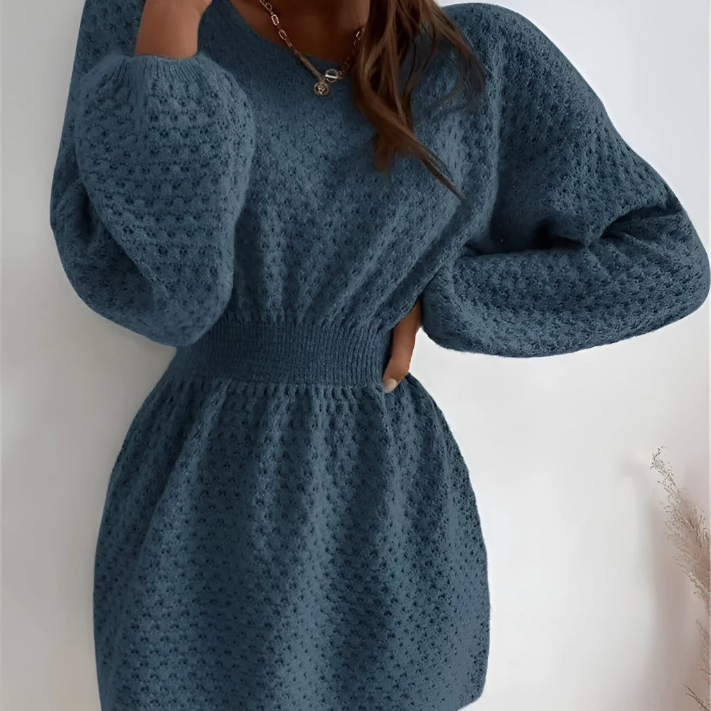 Blue women's slim-fit knitted dress with hand-crocheted flowers and a fitted waist.