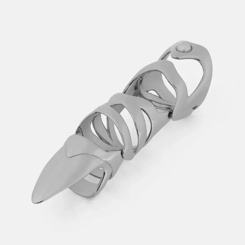 Silver alloy punk armour finger covers laid out on a dark surface.