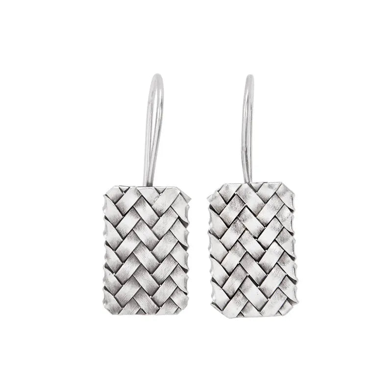 Geometric diamond plaid woven earrings in sterling silver measuring 17.5mm by 11mm