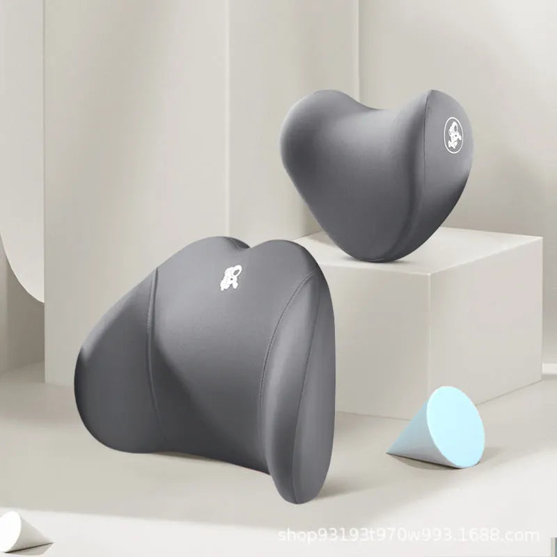 Heart-shaped car pillow in choice of colours, shown as headrest and lumbar support on a car seat.