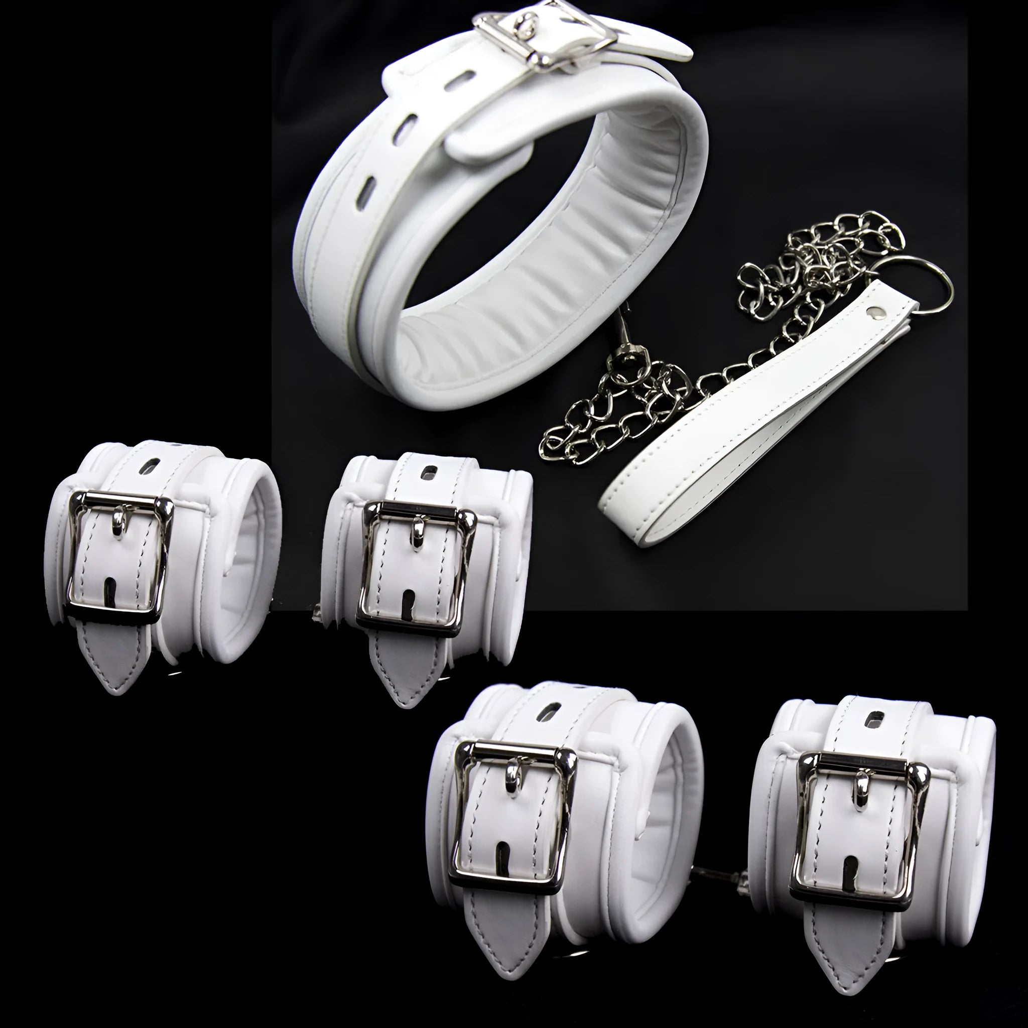 White PU sponge bondage restraint set showing handcuffs, footcuffs, and neck cuff