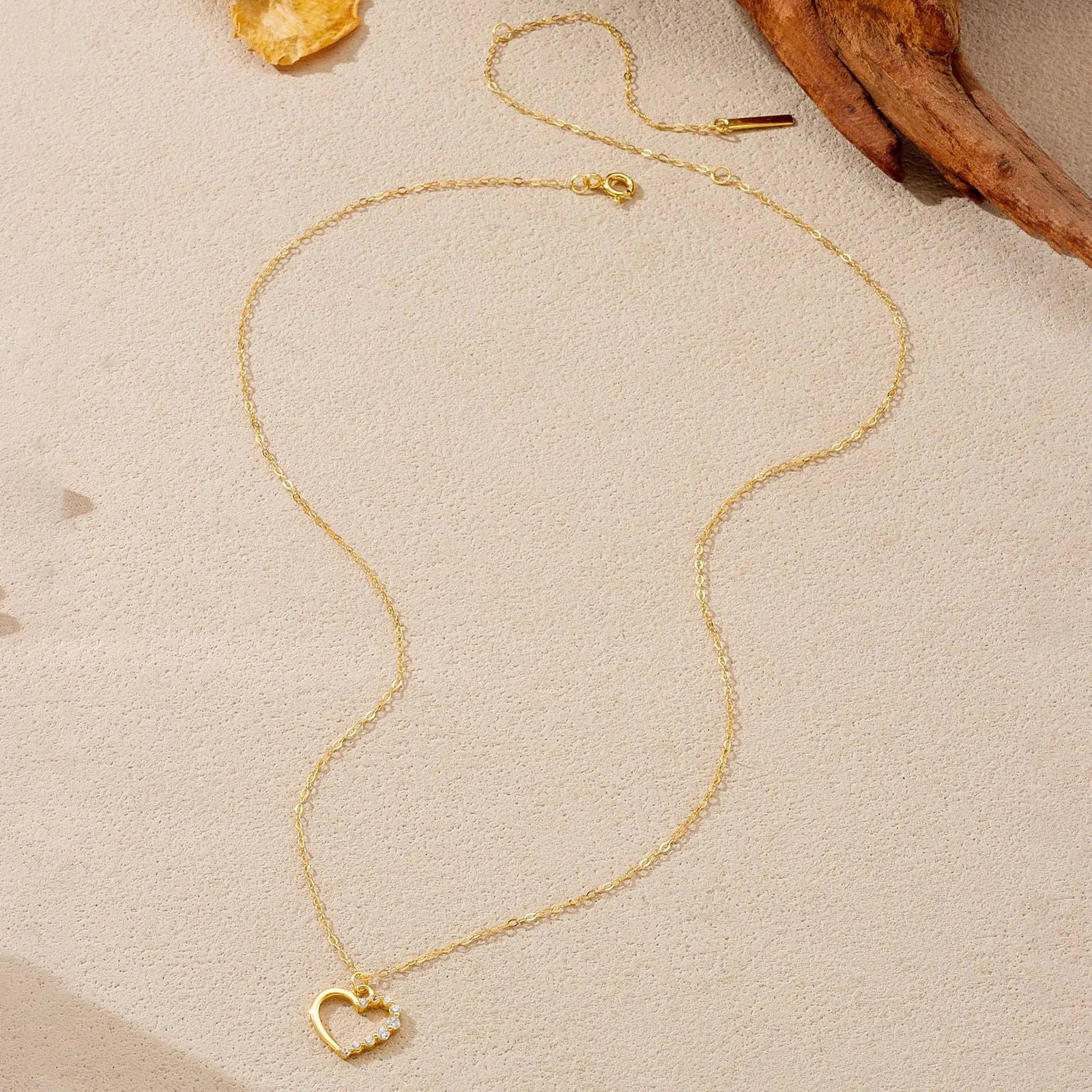 S925 sterling silver hollow heart necklace with choice of gold or platinum plating