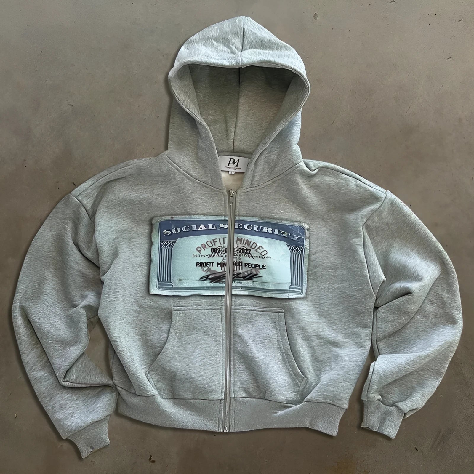 Unisex loose fit zip-up hoodie jacket with letter pattern in black, grey, or pink.