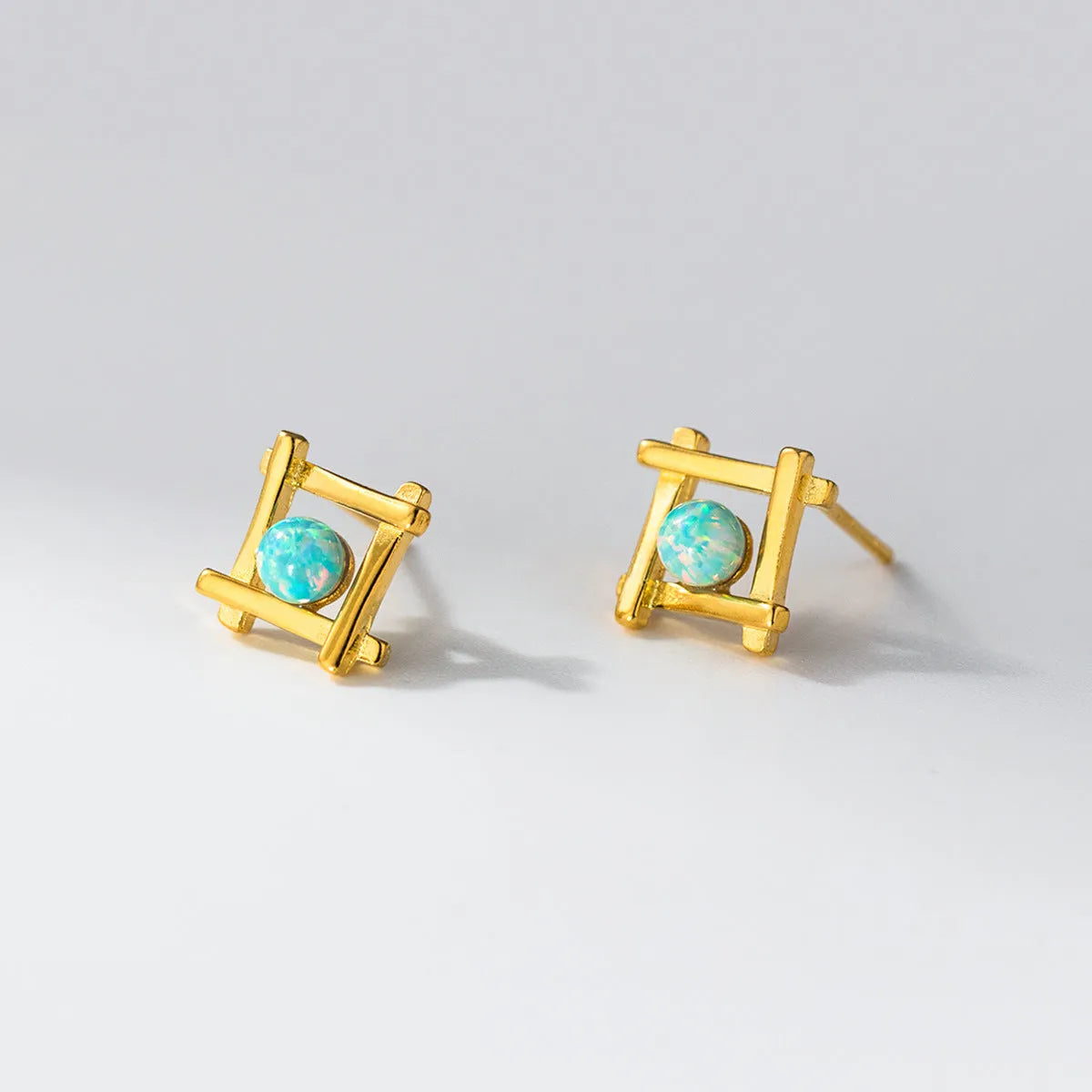 Women's geometric cross quadrangle stud earrings in 925 sterling silver with gold or silver finish