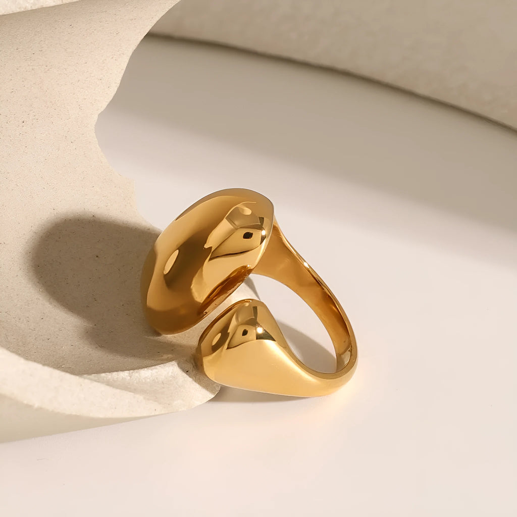 Stainless steel geometric open ring with electroplated metallic finish