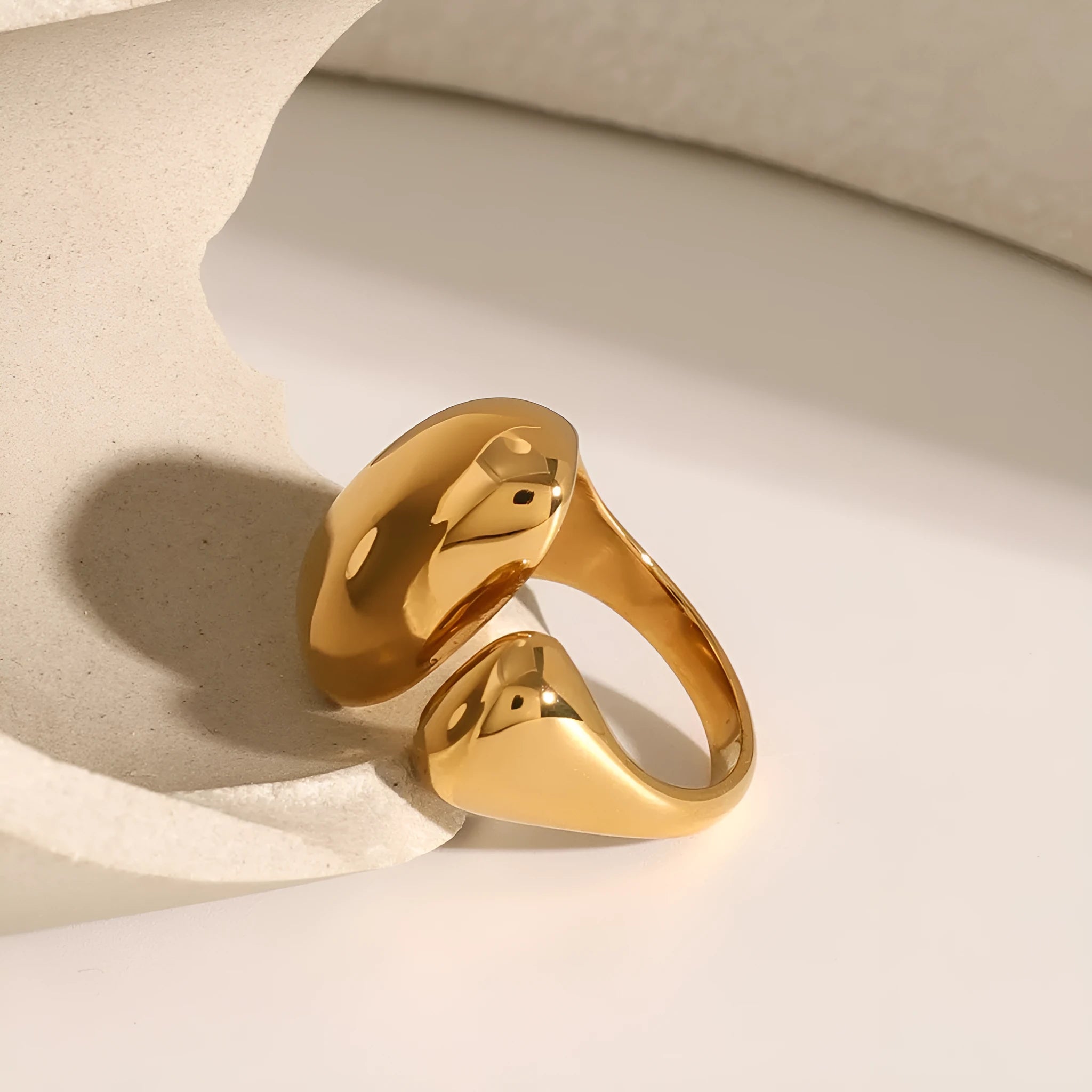 Stainless steel geometric open ring with electroplated metallic finish