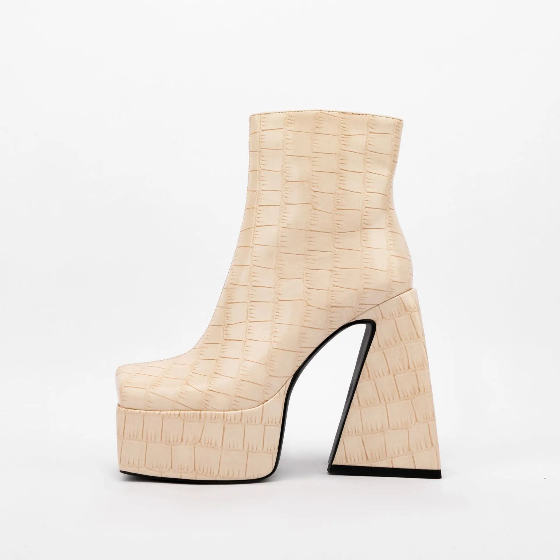 Women's ankle boot with a super high heel in a solid beige colour, made from artificial PU.