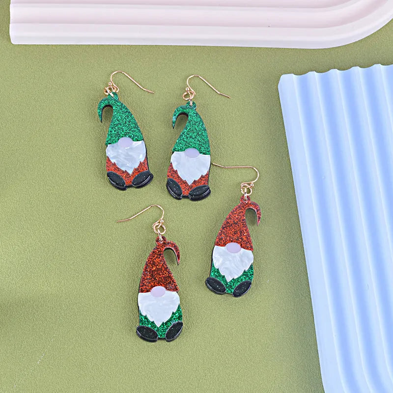 Cartoon-style Santa Claus character earrings made of red and green acrylic