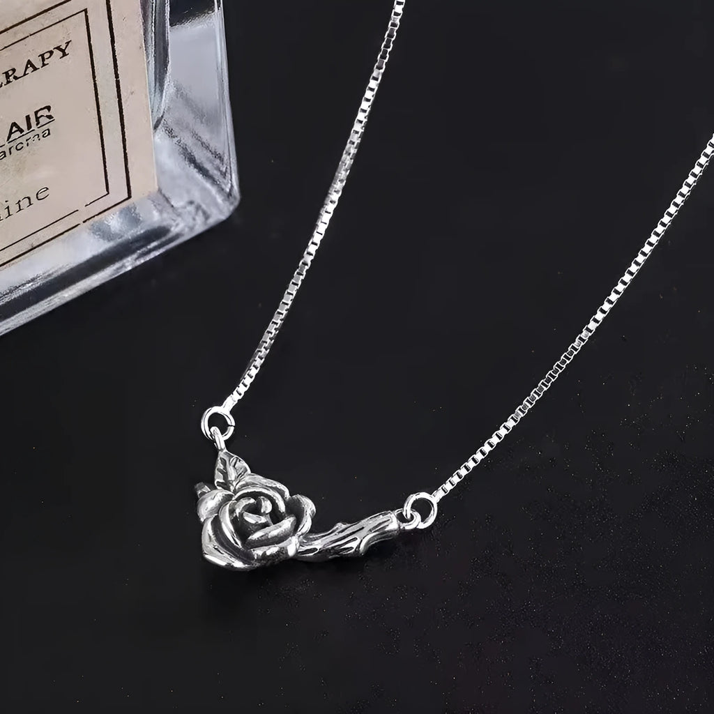 Retro black rose necklace with vintage distressed copper pendant on cross chain