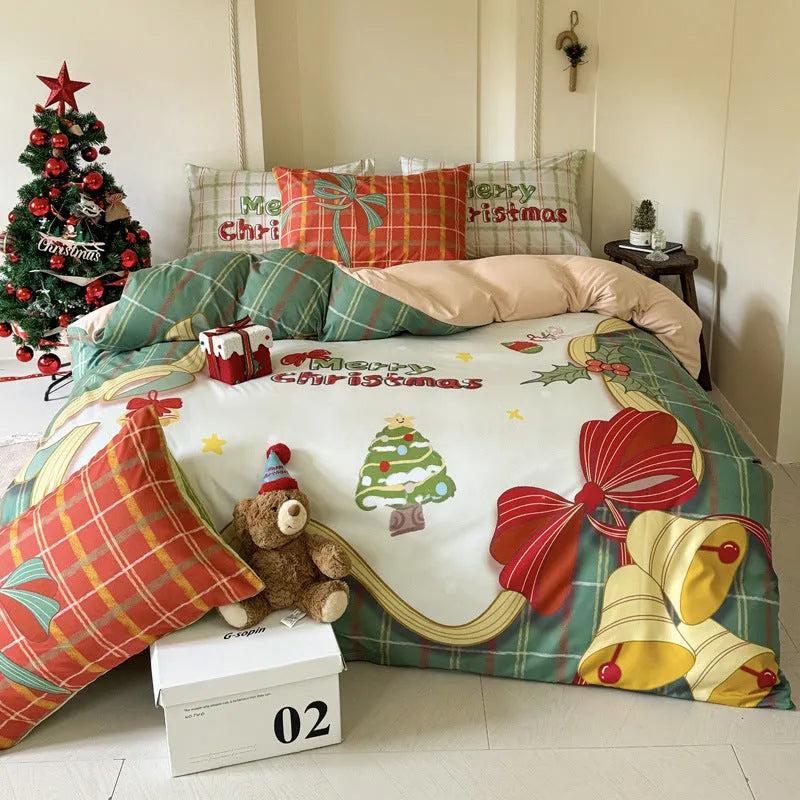 Christmas-themed cartoon printed duvet cover and pillowcase set on a bed, showing Gingerbread Man pattern.