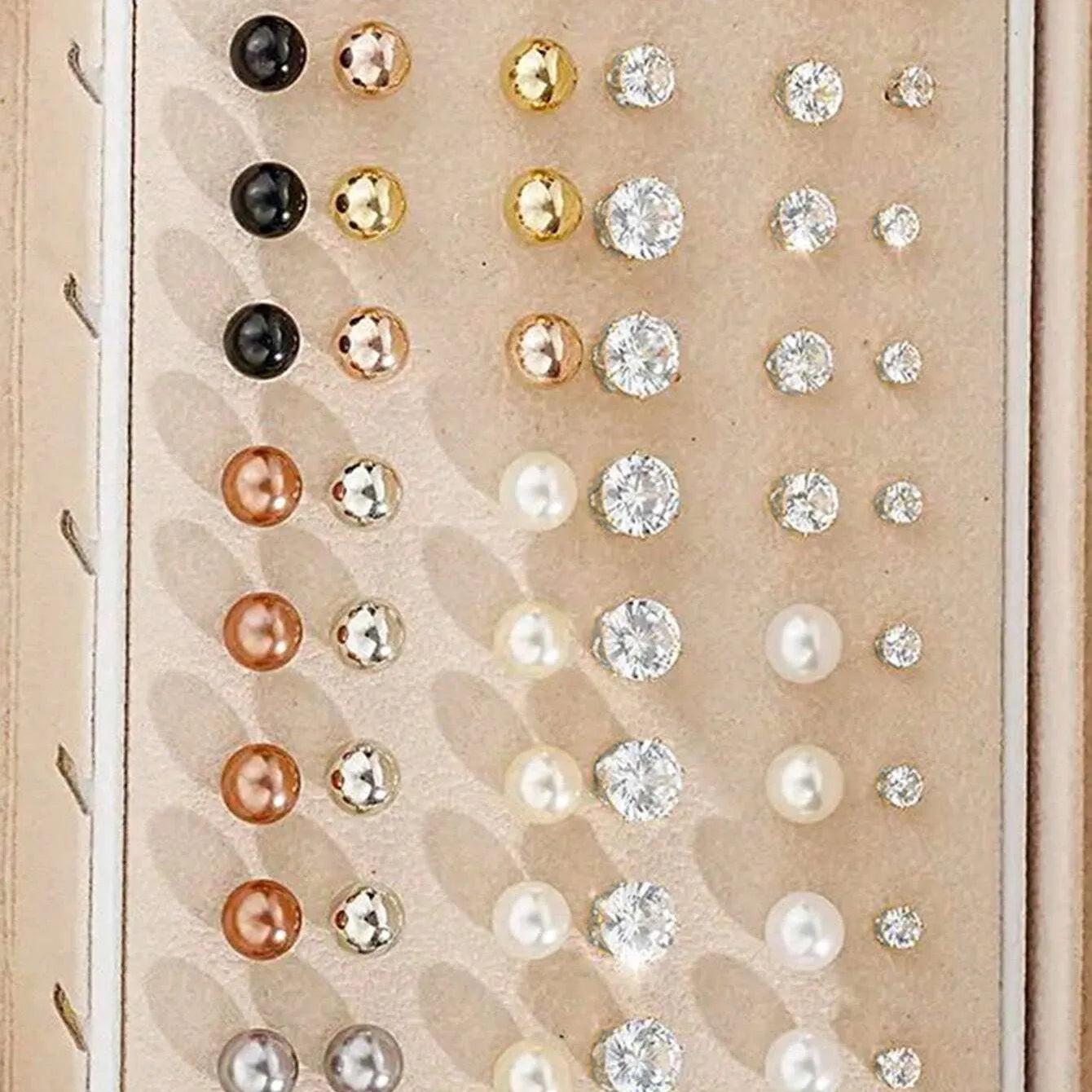 108 geometric pearl earrings in gold and yellow electroplated alloy arranged in combination set