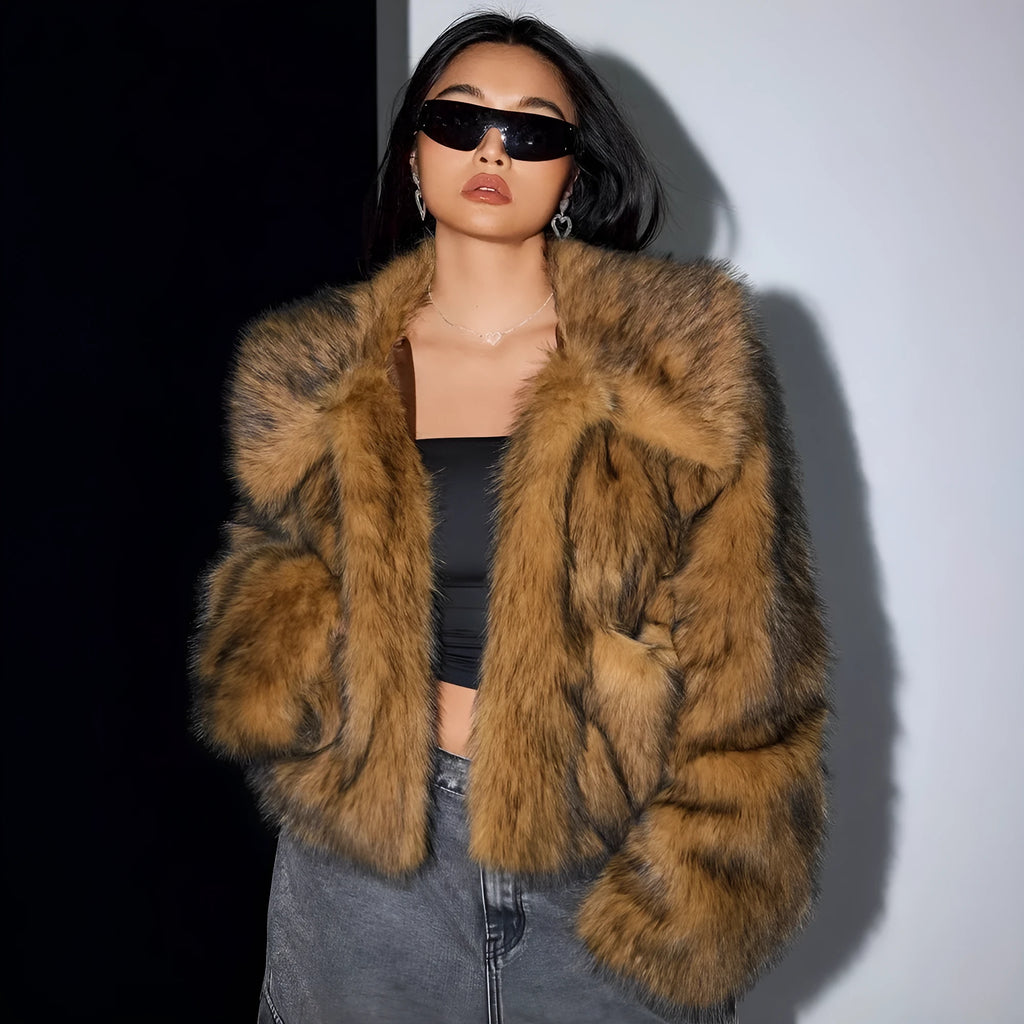 Artificial fox fur fashion coat with a fur collar and long sleeves in a short length.