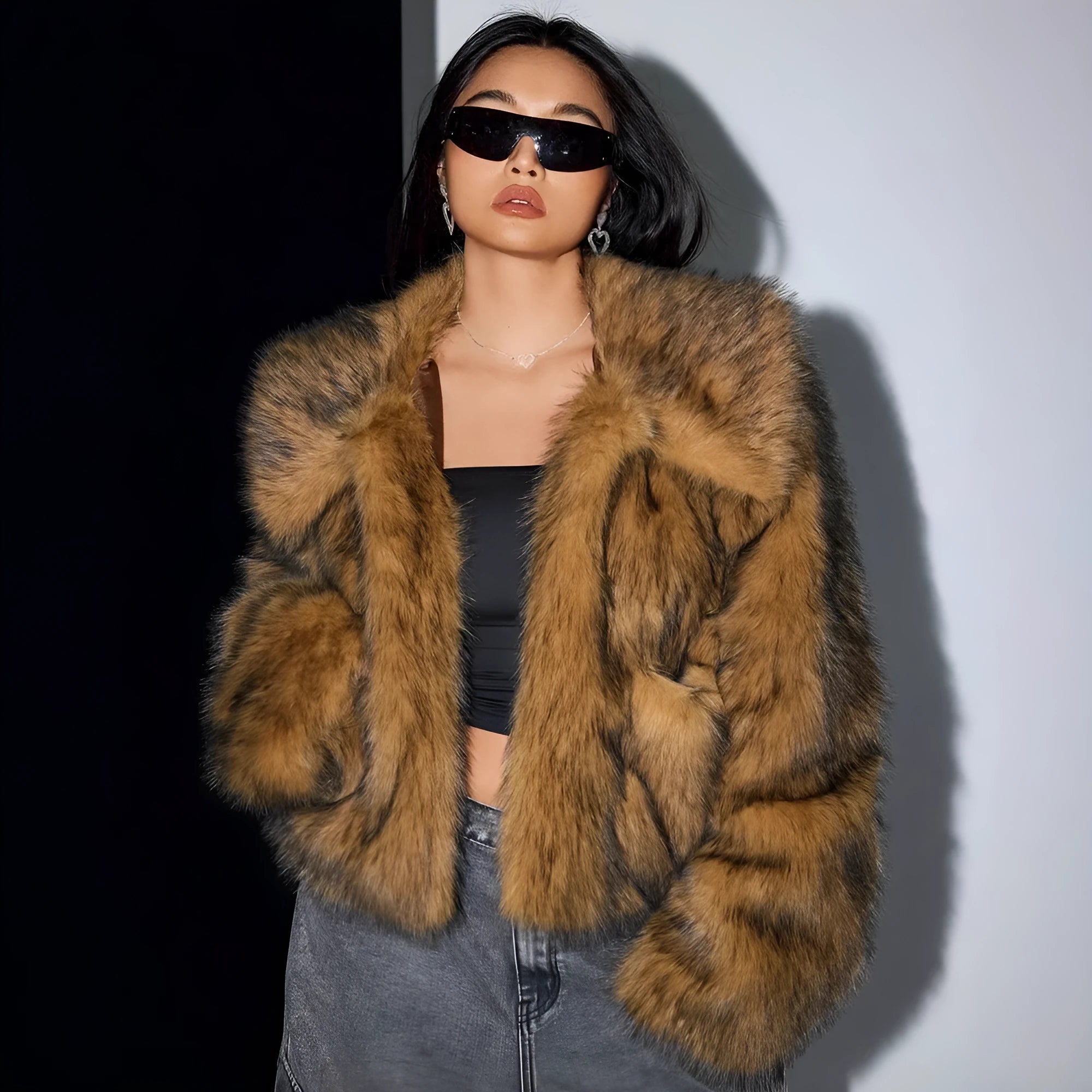 Artificial fox fur fashion coat with a fur collar and long sleeves in a short length.