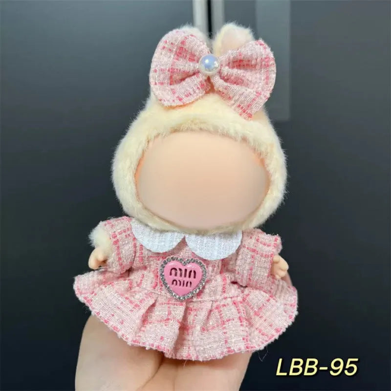 A plastic doll costume for a 17cm tall vinyl figurine on a white background.