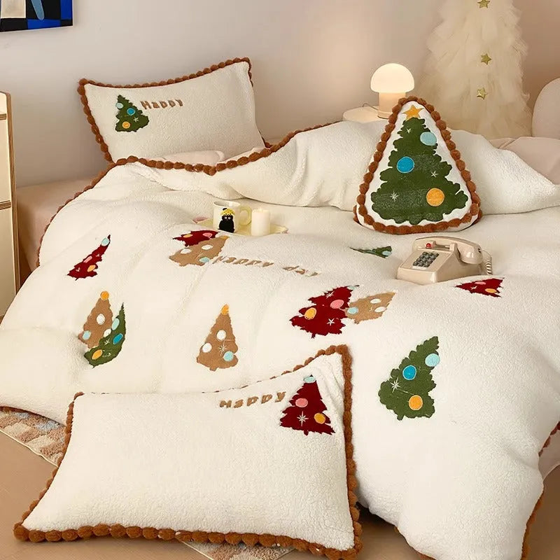 Bright yellow fleece-lined bedding set with embroidered Christmas tree pattern, shown on a double bed.
