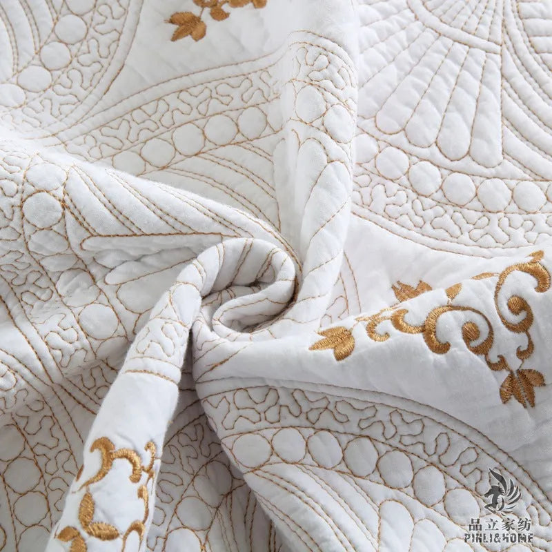 European style double thick pure cotton bed cover with embroidery, two pillowcases, on a 1.8 metre bed.