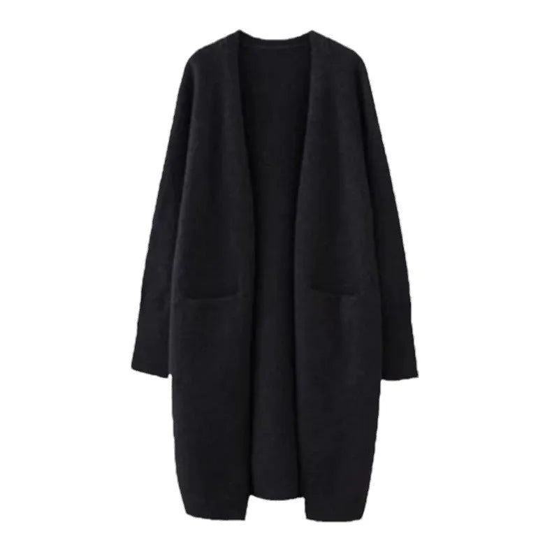 Women loose mid-length knitted cardigan in solid colour with long sleeves and pockets.