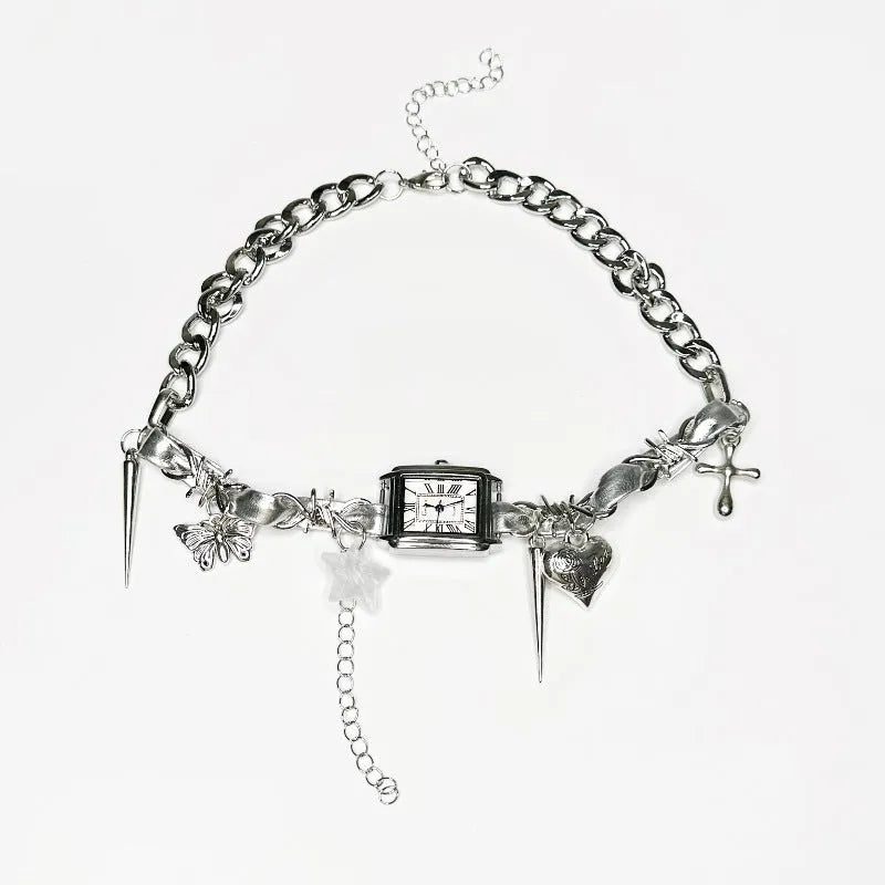 Dark style multi-layer cross necklace with twin clavicle chains showing electroplated alloy construction