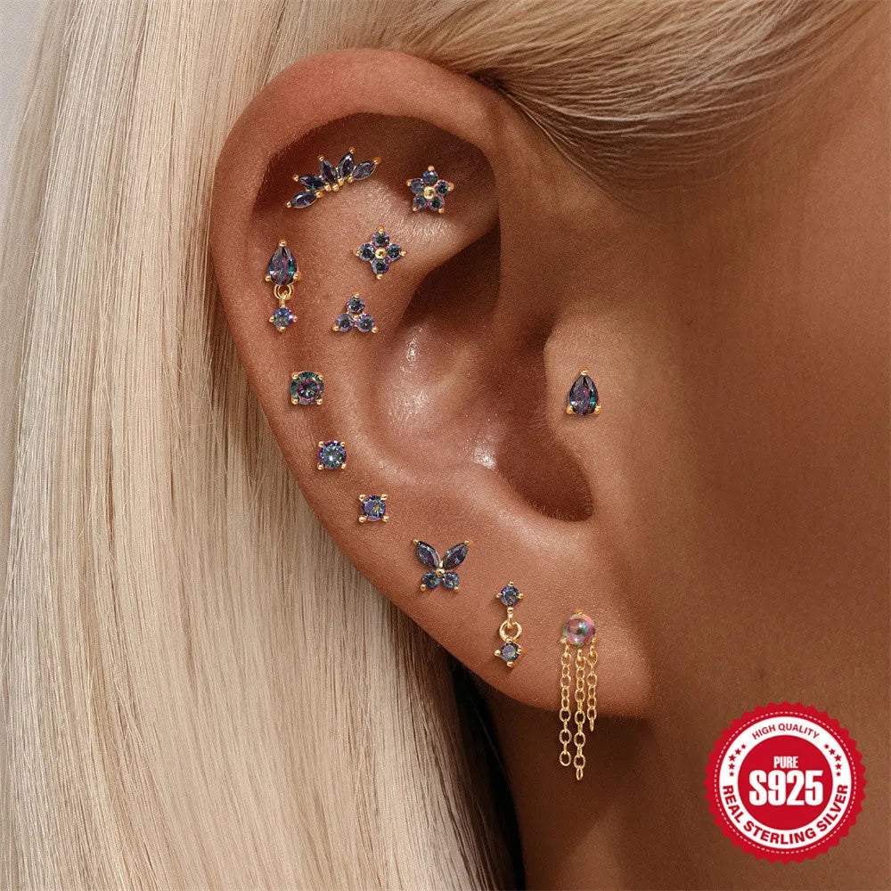 S925 sterling silver geometric thread piercing with flat head and rainbow stone in gold colour.