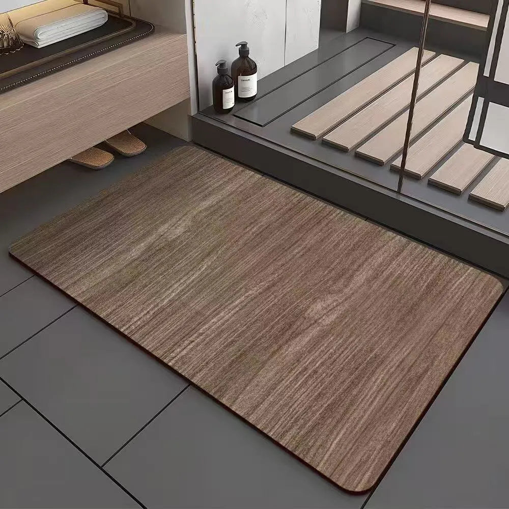 Square diatomaceous earth bathroom floor mat with geometric pattern and wood-grain colour design.