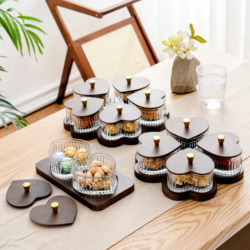 Glass serving platter with heart-shaped lids in a 4-grid configuration on a table