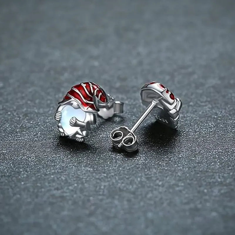Women's silver-toned heart-shaped earrings with a Santa Claus decoration.