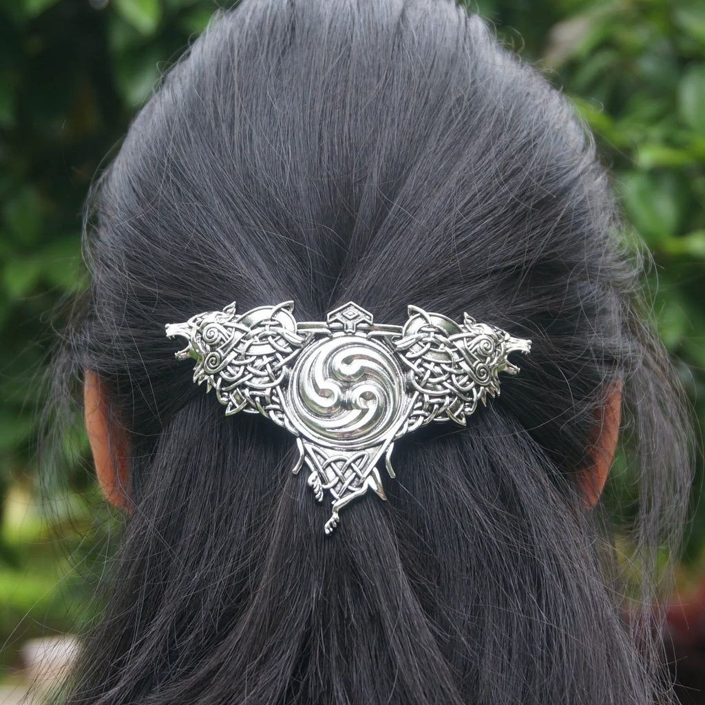 Women's Nordic retro double wolf hair clip in silver alloy on a light background