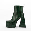 Women's ankle boot with a super high heel in a solid beige colour, made from artificial PU.
